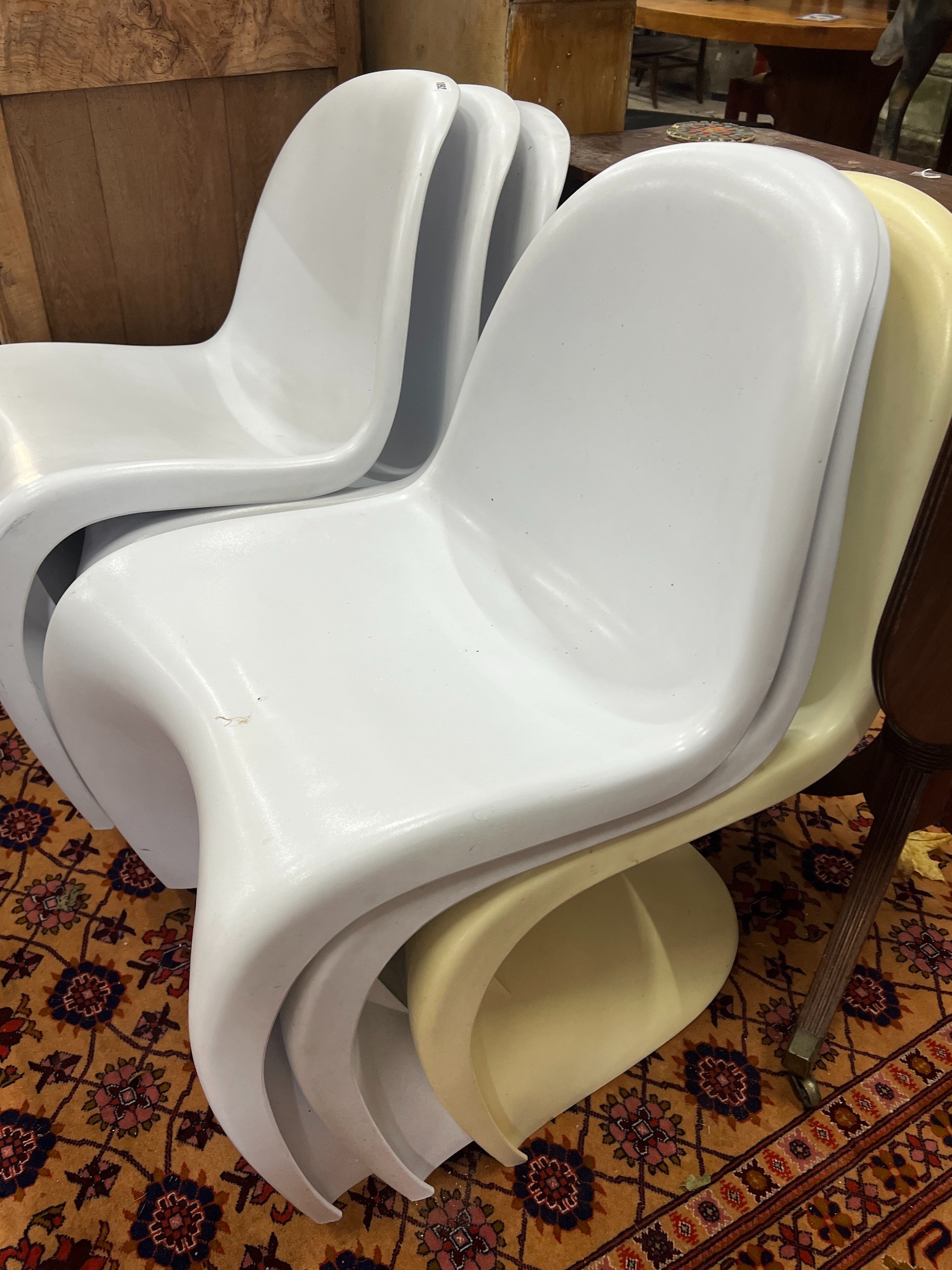 A set of six Vitra Panton style chairs, one differing in colour